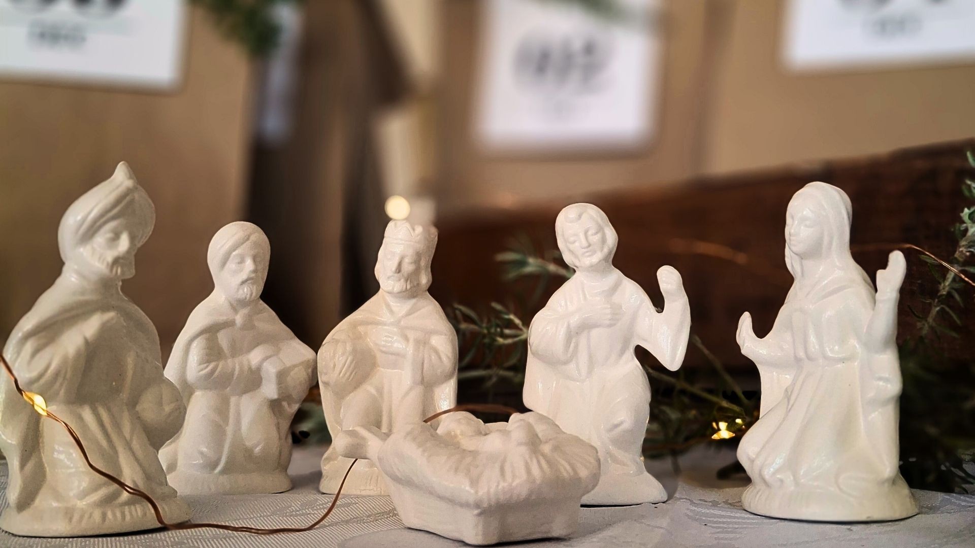 Porcelain Nativity figurines depicting the birth of Jesus.