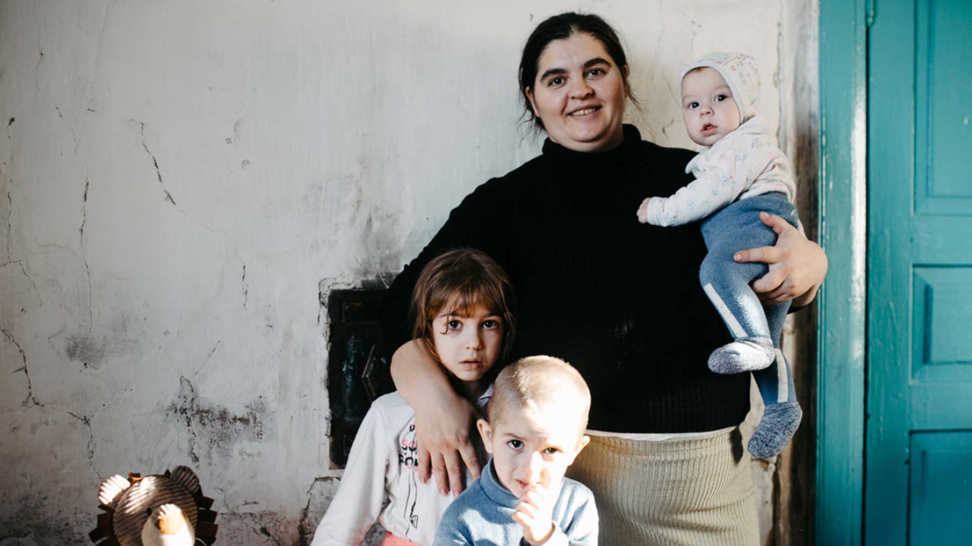 A mother with three of her children, Ukraine.